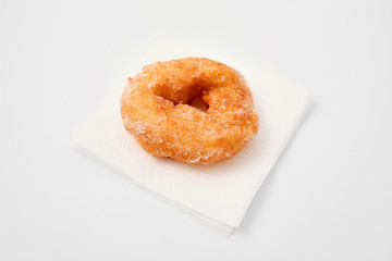 floury product. puff with sugar on a white background.