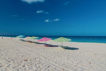 Fototapeta na wymiar panorama of the Eagle Beach of Aruba Caribbean island with white sand and palm trees in the tropical scenery of the Netherlands Antilles