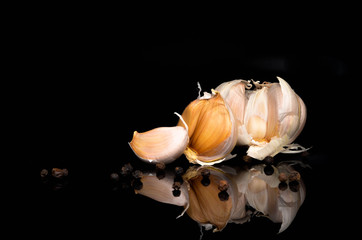 Garlic on a black background.