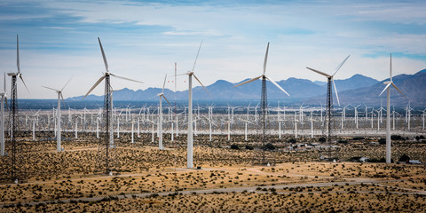 Wind turbine power generating farm on a sunny day in Riverside County, California