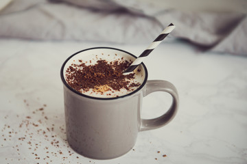 cup of cappuccino with chocolate