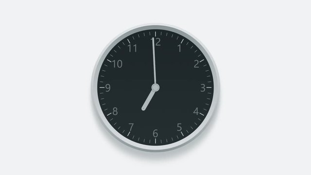 Office clock on the wall measuring off working hours from 9 a.m. to 7 p.m.