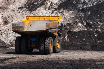 Big dump truck is mining machinery, or mining equipment to transport coal from open-pit or open-cast mine as the Coal Production