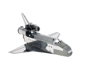 Spaceship / View of toy spaceship on white background.