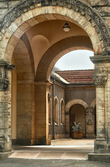 Naklejka premium Arch and patio of the chapel at the South Cemetery in Leipzig