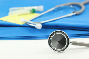 Stethoscope and medical equipment on blue doctor coat, Healthy concept