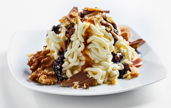 Spaghetti ice cream dessert with chocolate sauce