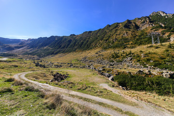 Autumn landscape with Capra river and Fagaras mountains alongside the famous Transfagarasan road in Sibiu county, Romania