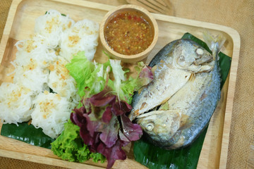 Wrapped mackerel served with fresh vegetable and special sauce