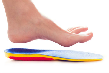 orthopedic insole and female leg