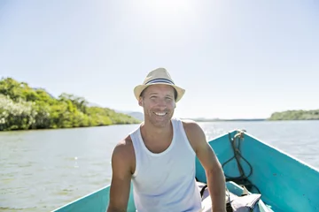 Foto op Canvas Joyful man portrait on boat © Louis-Photo