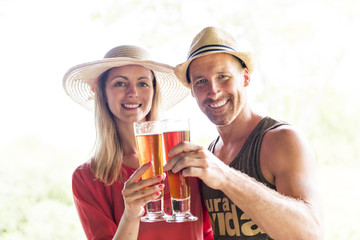 romantic couple drinking beer in a south bar