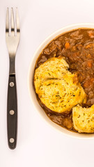 Traditional British Beef Casserole With Dumplings