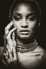 Zelfklevend Fotobehang beautiful woman wearing chain jewellery in black and white photo © Zdenka Darula