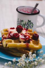 Delicious home made desert with waffles, fruits and ice cream
