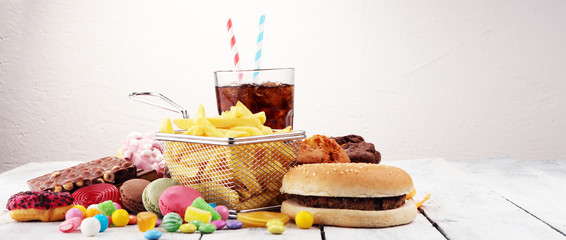 Unhealthy products. food bad for figure, skin, heart and teeth.