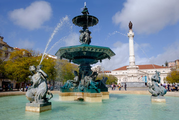 Fototapeta na wymiar Rossio Square, Lisbon. March 11th 2018. Fountains in the Rossio Square.