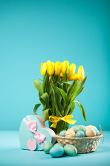 Yellow tulips on blue background