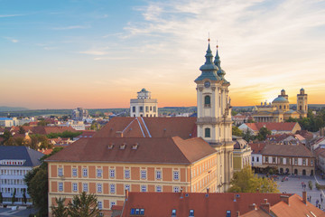Obraz premium Beautiful view of the Minorit church and the panorama of the city of Eger, Hungary, at sunset