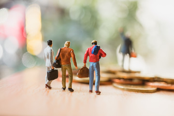 Miniature people, businessman on travel using as global business and travel - Vintage filter