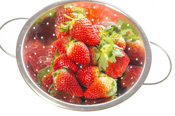 red strawberries isolated on a white background