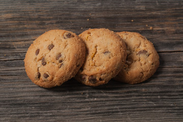 American cookies with chocolate on raw old boards