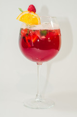 red alcoholic drink with ice on white background