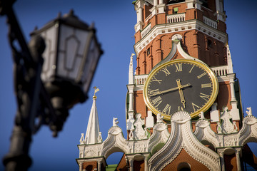 Exploring the clock towers and ornate exteriors of the Kremlin and Red Square in Moscow, Russia.