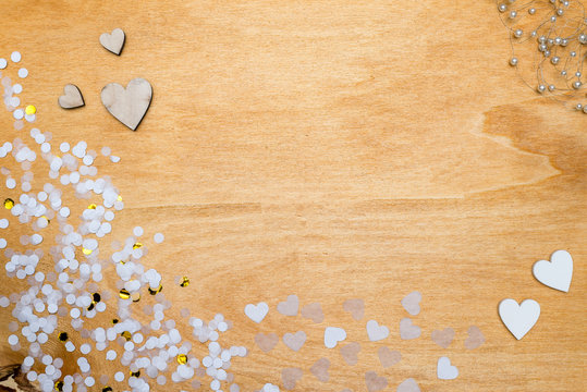 Wedding decoration for party with confetti, pearls and hearts from above