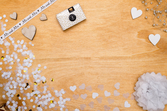 Wedding decoration for party with confetti, pearls and hearts from above