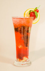 red alcoholic drink with ice on white background