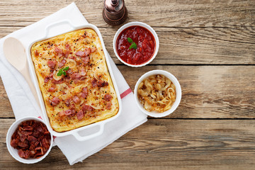  Potato casserole with parmesan cheese, cream and delicious fried bacon.top view