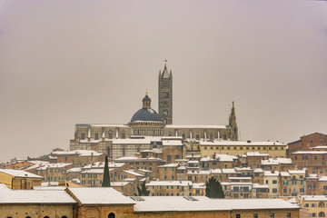 View of Siena in winter during a snowfall
