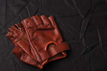brown gloves for playing sports