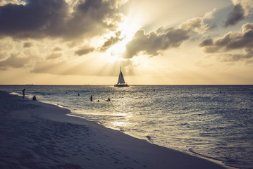 Scenic view of a sunset in the Eagle Beach. Caribbean landscape.
