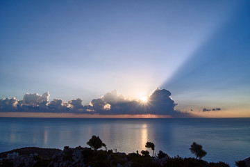 Naklejka na ściany i meble Sunrise over the Mediterranean Sea on the island of Rhodes .