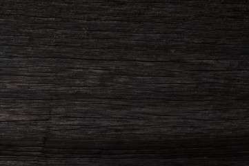 background of an old blackened wooden board