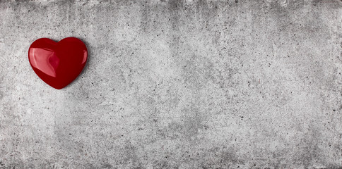 heart symbol on a cement surface