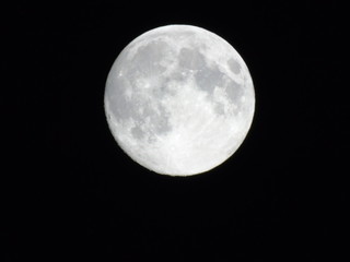 Amazing full moon over the city of Genova in winter days