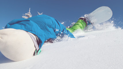 CLOSE UP: Cross country rider slams his head against fresh snow after crash.