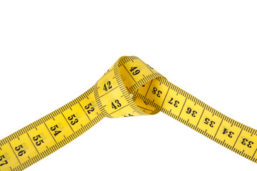 The concept of diet. Color measuring tape on a white background