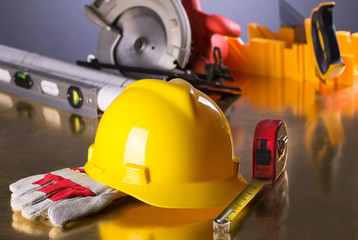 Construction Gear on Gold Tabletop with Hardhat 