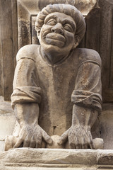 Ancient corbel, located under balconies of city hall, represent different aspects of characters medieval era, Cervera, province Lleida, Catalonia.Spain.