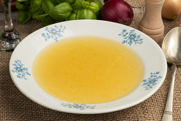 Chicken bone broth served in a plate