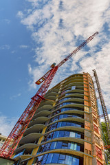 view from below upwards on the construction of a tower crane