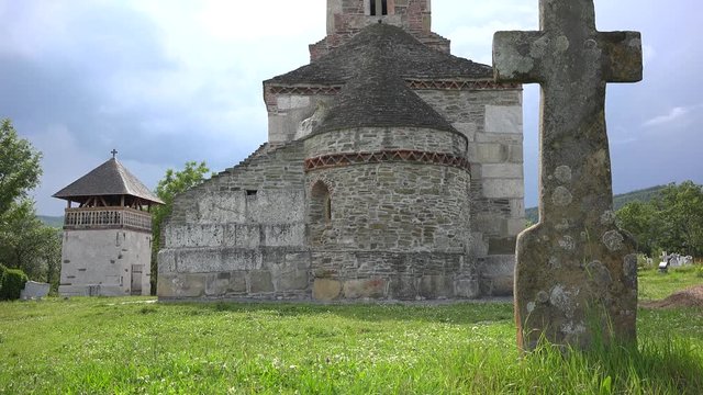Ancient stone church in Densus, Romania 4k