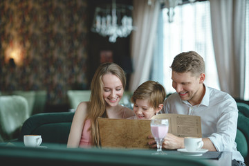 Smiling family in a restaurant