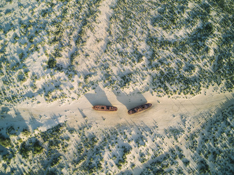 aerial view of abandoned trawler in former aral sea