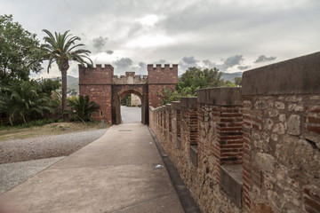 Fototapeta na wymiar Castle ,ancient entrance and walls, Castelldefels,province Barcelona, Catalonia.