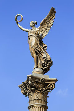 The gold Angel in front of House of Artists, Prague, Czech Republic